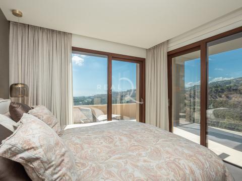 master bedroom with sea and mountain views