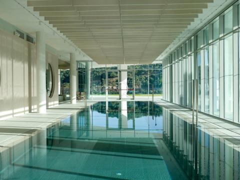 wellness center with indoor pool, sauna, gym, yoga, pilates, 